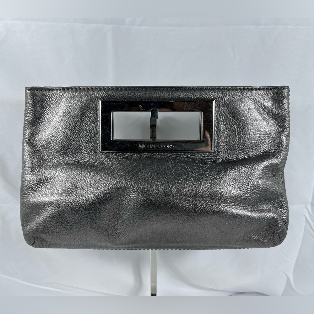 7017: Michael Kors Metallic Silver Leather Clutch Bag